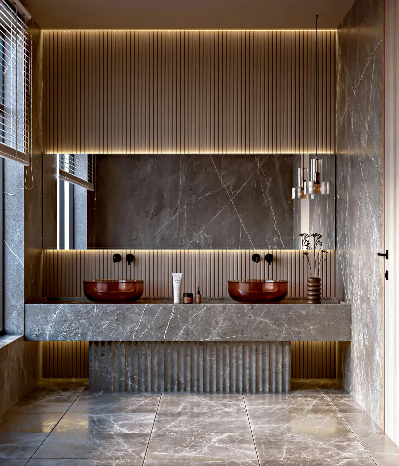 Salle de bain en marbre gris avec double vasque et éclairage intégré